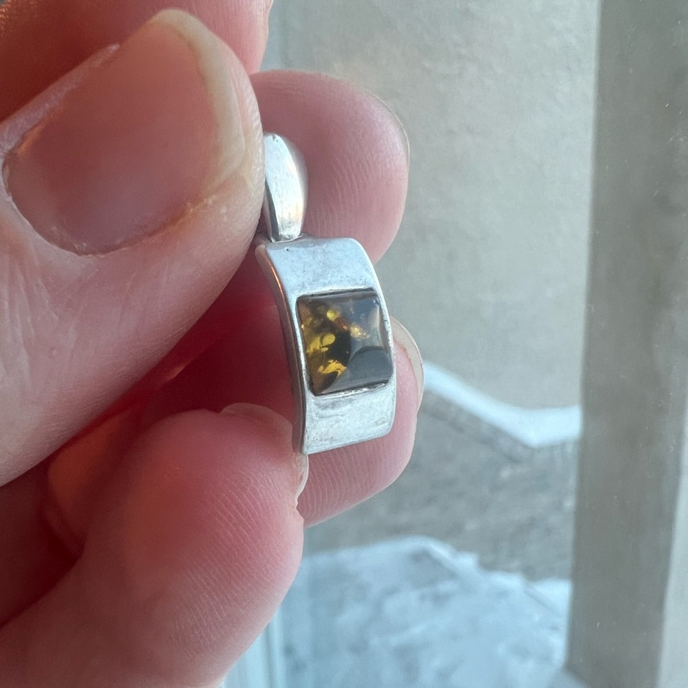 Elegant Sterling Silver and Green Amber Pendant